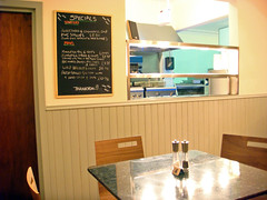 Specials board and kitchen at The Tailend Fish Restaurant and Fish Bar, Edinburgh