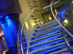Stairs linking ground floor to upper Paris bar in Le Monde on Edinburgh's George St