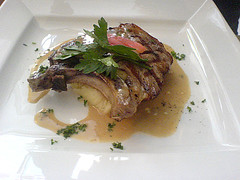 Pork on a bed of mash with gravy sauce at Edinburgh's Maison Bleue