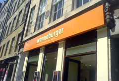 Exterior sign above Wannaburger on Edinburgh's Royal Mile